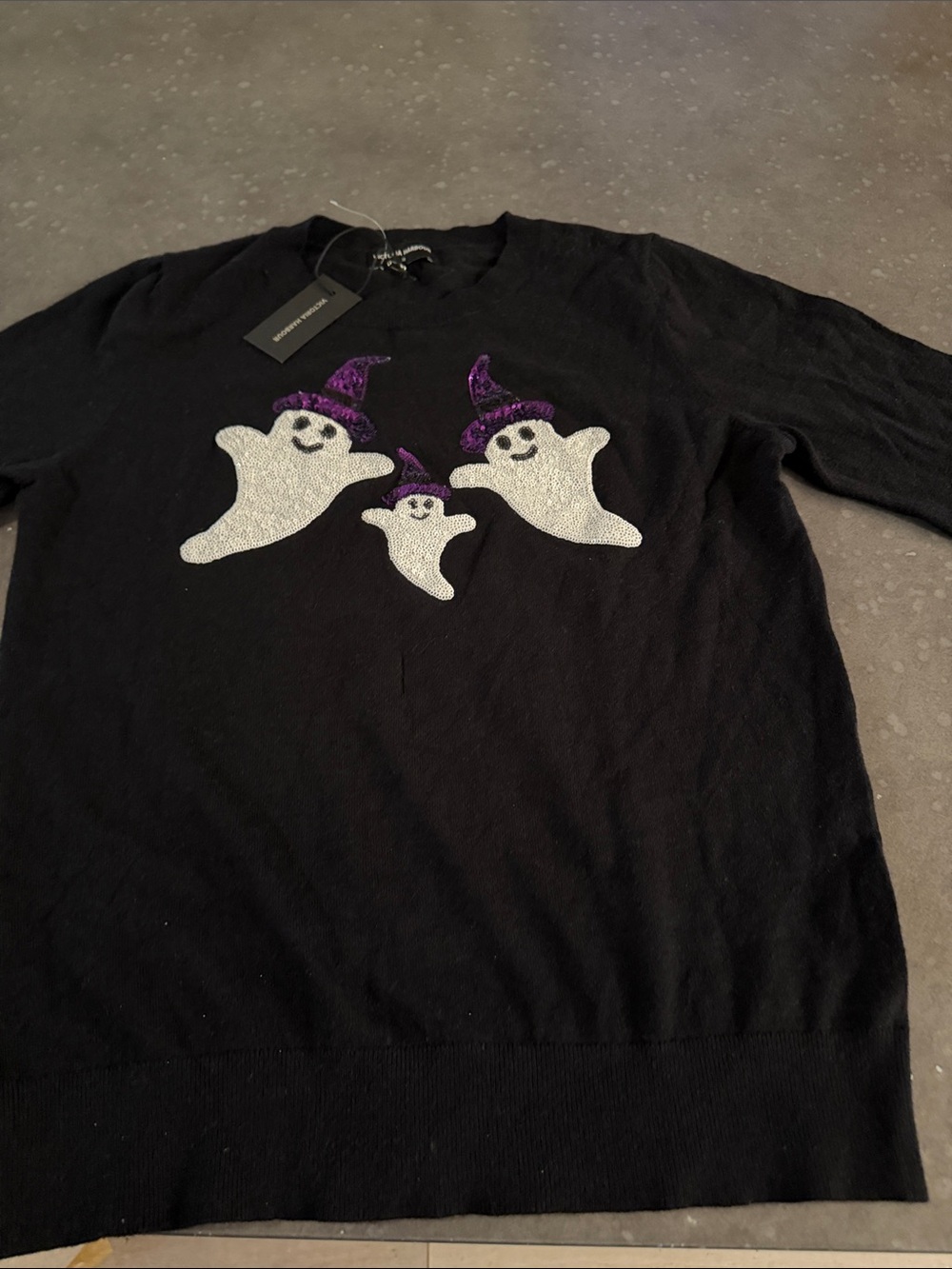 Women’s Black Crewneck Sweater with Ghost Graphic and Purple Hats
